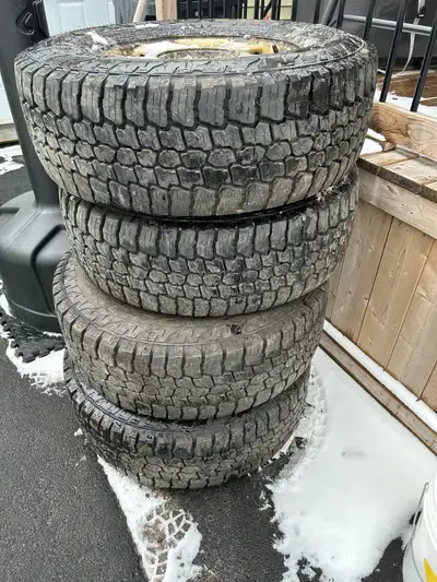 265-70-17 tires with 2010 f150 factory rims. The tires have lots of tread left, aluminum rims are sc...