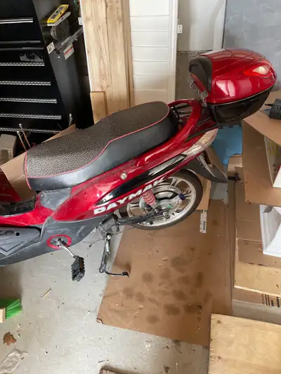 Daymak electric scooter with full fairings and LED lighting. LED headlight, taillight, turn signals...