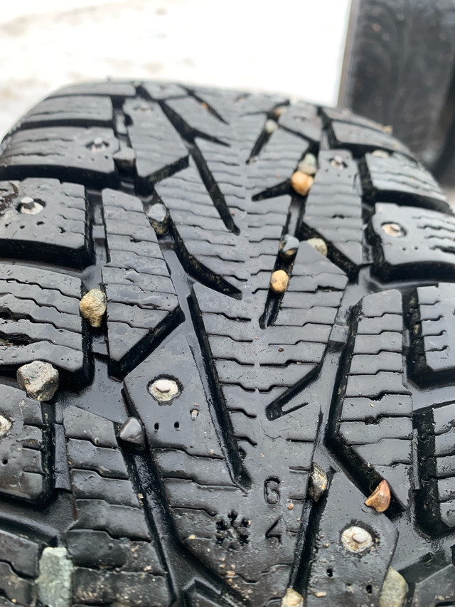 Near new 195/65R15 winter studded tires fits Toyota on rims in Tires & Rims in Whitehorse