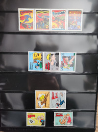 POSTAGE STAMPS (comic book-themed) w/page holder incl.