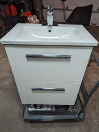 24 inch wide bathroom vanity with sink and faucet 