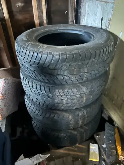 Selling a set of four Mirage 235/70R16 winter tires, perfect for providing reliable traction during...
