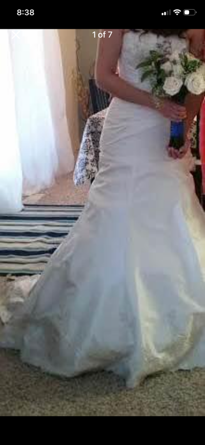 Size 4. Used for only a couple of hours. Ivory colour and beautiful train. Would fit a slim person,...