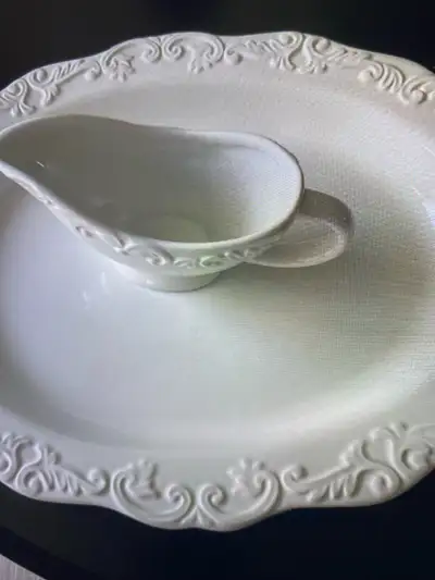 Add a touch of elegance to your dining experience with this beautiful white oval turkey platter and...