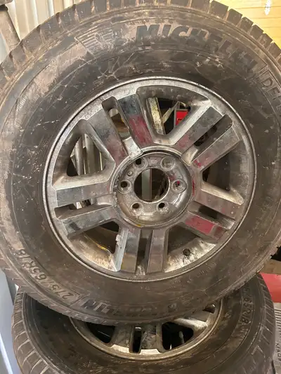 Selling 4 Michelin Defender tires 275 65 18 on rims Came off of a F150 200 Leave your contact number...