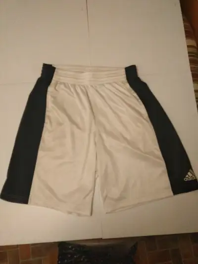 Large NEW has pockets and drawstring inside Sporty Adidas workout shorts that manage moisture. mesh...