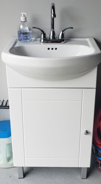 24 inch white vanity with a ceramic top