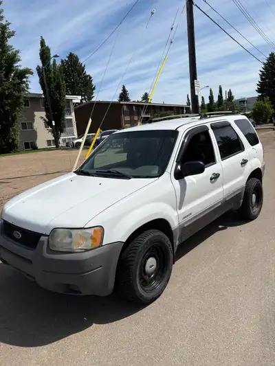 2001 escape for price 1900 250 KXLS good tires all the way around new windshield clean inside and ou...