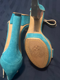 Turquoise high heeled sandals. Size is 7.5M/ 37.5