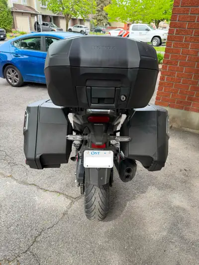 Honda Top Case and Side Bags to fit 2026 Honda NT1100. Top Case and Side Bags come with Grey colour...