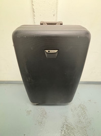 Delsey large hard shell clamshell suitcase