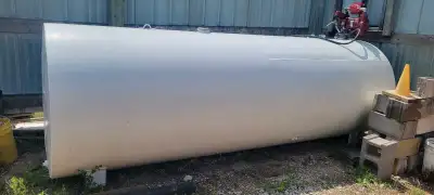 1,000 gallon above ground fuel tank complete with pump, hose and meter.