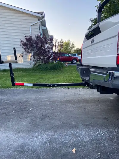Hitch mounted truck bed extender. Used once to bring home a 16 foot canoe. Adjustable height and wid...