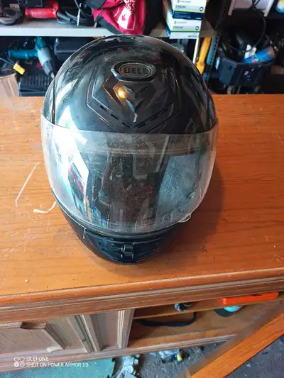 This is a Bell motorcycle helmet designed to provide reliable head protection for riders. This full-...