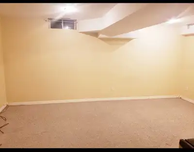 One large basement suite and bathroom available for rent on the lower level of a clean townhouse. Th...