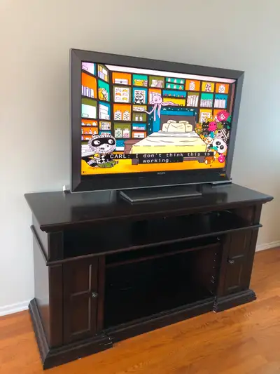A 46" SONY TV with stand for sale, View more