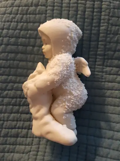 3 1/2 inches tall. In original box. No damage.