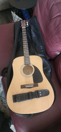 Fender acoustic guitar, shoulder strap  and soft case