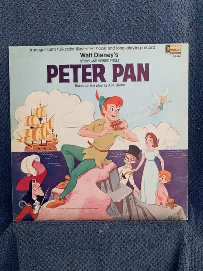 Relive the magic of Neverland with Walt Disney's Peter Pan story and songs on this vintage record, f...