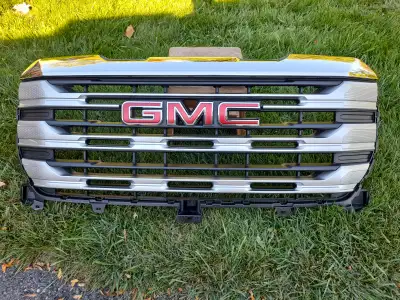 OEM new 2025 take off, mint condition, chrome header with GMC emblem. Will fit most 2022, 2023, 2024...