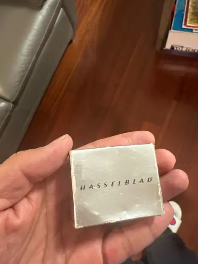 This is a vintage Hasselblad Rapid Winding Crank in its original box. It appears to be in good condi...