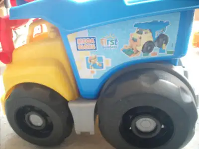 Oversize toy dump truck + lots more goodies for sale     2178-86, View more