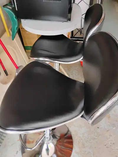 Swivel and adjustable bar stools/chairs. Clearing out our stora, View more
