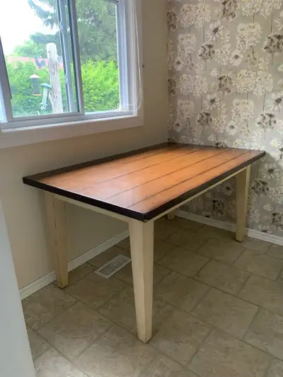 Pier 1 Imports Carmichael Rustic Dining Table Features a durable wooden top and sturdy legs. It is i...