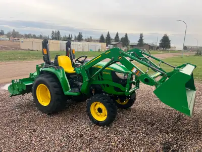 2022 John Deere 3032E comes with mower rotary tiller and pole auger like new asking $42000 for the c...