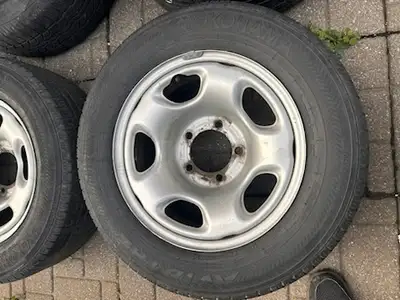 4 Steel Rims / Wheels used but in good condition. The rims are in the tires but the tires themselves...