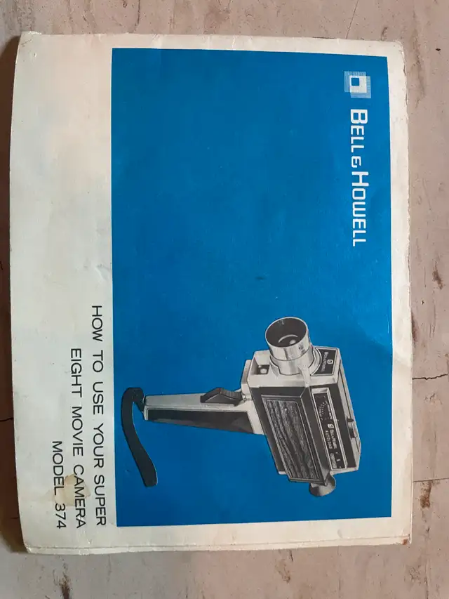 Vintage Bell and Howell super 8 movie camera63351297099777124
