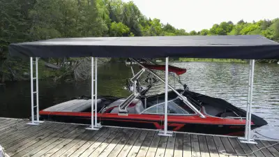 Protect your boat from the elements. Canopy size is 12' x 20' Visit : www.boatshield.ca