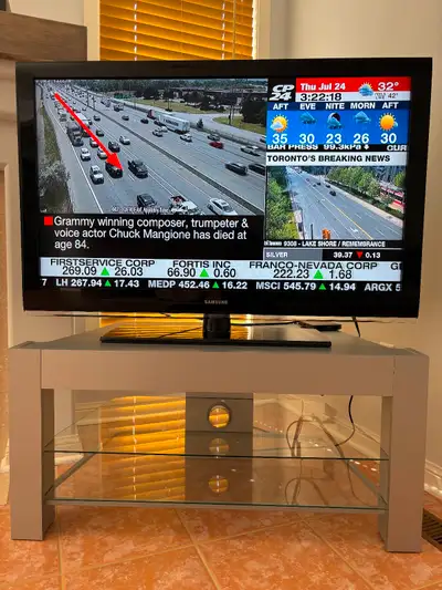 Samsung 48” TV with stand, View more
