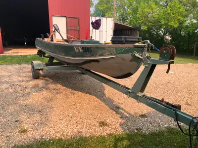 Boat comes with SK plated trailer, new trolling motor, 2 paddles & 2 life jackets.