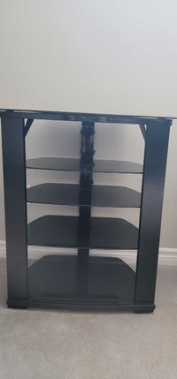 Side table with black glass shelves