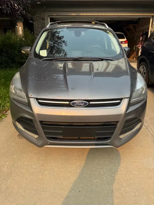 2014 Ford Escape Titanium **Rear left damage**526224465950167043