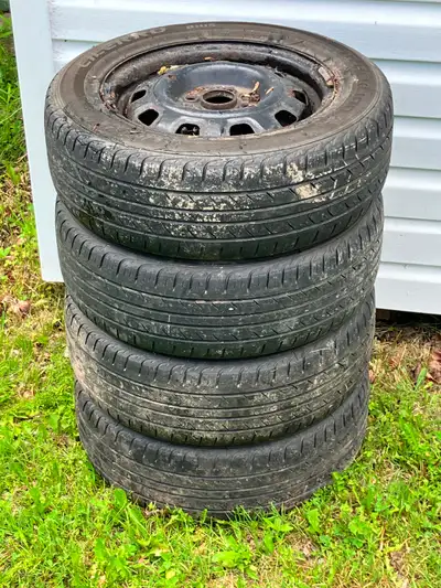185/65/14 tires mounted on steel wheels with 4x100mm bolt pattern.. will mount on kia or hyundai.. n...
