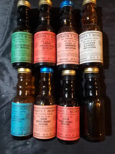 8 Vintage Bottles of Noirot Imitation Flavouring, all but one have original French labels. All are u...