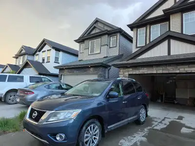 Selling a reliable, spacious 2016 Nissan Pathfinder with 220,000 km. This has been a fantastic famil...