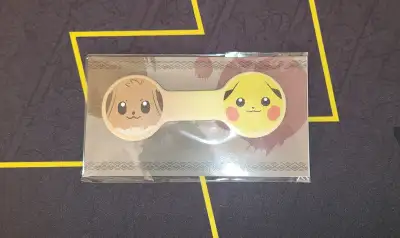 Pokémon™ Legends: Arceus Pikachu and Eevee Mask Cable Strap, View more