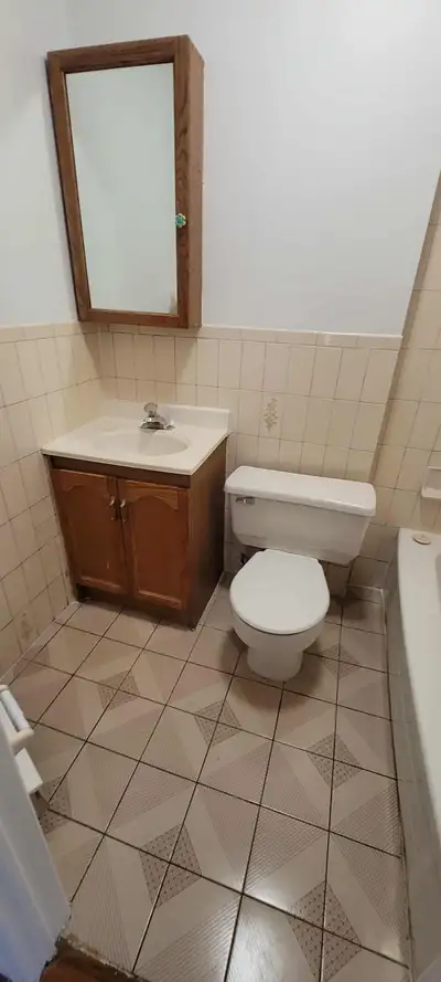 Bright two bedroom, one bathroom apartment for rent available now in a Victorian house in the heart...