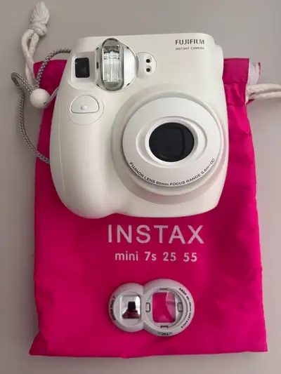 Here are a few short description options for the Fujifilm Instax 7S: A fun, easy-to-use instant came...