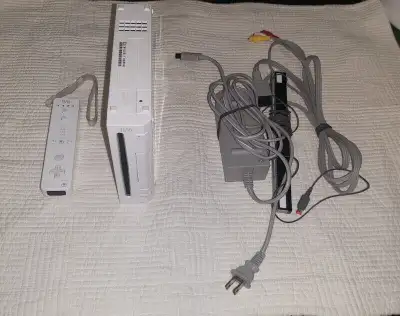Wii console one controller, sensor, cords. 80.00. Wii Gibson guitar 50.00. Wii balance board with ca...
