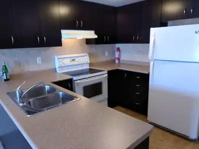 * 2 PARKING SPACES INCLUDED * Two bedroom + Den condo - Guelph's south end on Goodwin Ave * 2 PARKIN...