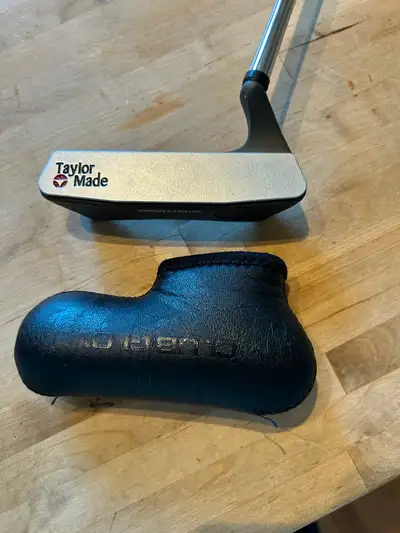 Golf putter., View more