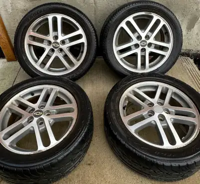 Chevy cavalier Z24 Rims 205/50R16 Alwys kept indoors no crack no bends all tire hold air 5x100 bolt...