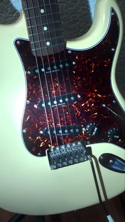 Fender Stratocaster Squire with Seymour Duncan pickups Seymour Duncan pickups. Cream colour with tor...