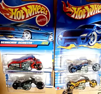 Selling as a lot, all new in packages, 4 hotwheels chopper bikes. $20.00 for the set of four. Each o...