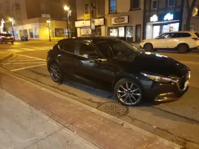 Selling a used 2018 Mazda 3 hatchback with 158000 kilometers. This fuel-efficient and stylish vehicl...
