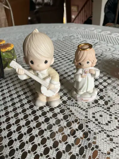 2 Precious Moments figurines , View more